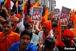 Demonstrators chant slogans as they protest against the release of the upcoming Bollywood movie 'Padmavati' in Bengaluru, India, Nov. 15, 2017.