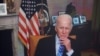 El presidente Joe Biden, que permanece en aislamiento tras dar positivo por COVID-19, participa en una reunión virtual desde la Casa Blanca, el 25 de julio de 2022.
