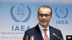 Acting Director General of the International Atomic Energy Agency (IAEA) Cornel Feruta addresses the media during a news conference at the International Center in Vienna, Austria, Nov. 21, 2019.