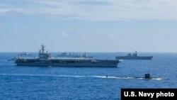 美國、印度和日本的海軍力量2018年6月15日在菲律賓海舉行馬拉巴爾Malabar年度聯合軍演(美國海軍照片）