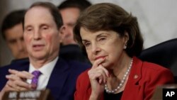 Senate Intelligence Committee member Sen. Dianne Feinstein, D-Calif., right, listens as Attorney General Jeff Sessions testifies on Capitol Hill in Washington, D.C., June 13, 2017.