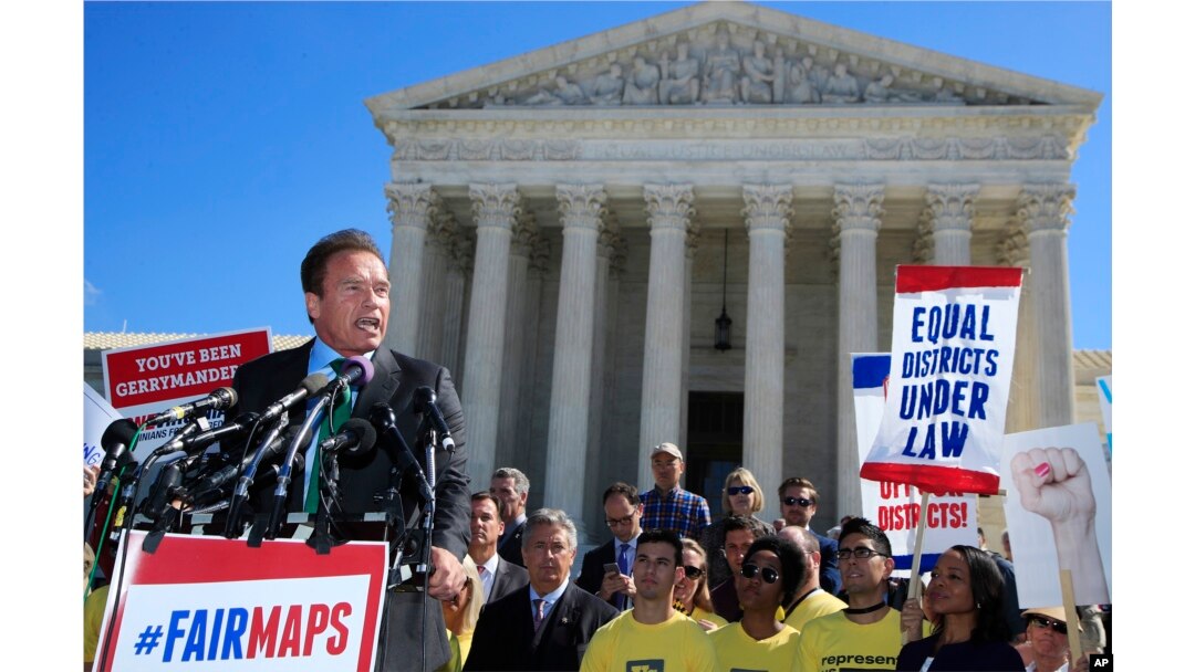 Former California Gov. Arnold Schwarzenegger speaks at a rally outside the U.S. Supreme Court in Washington, Oct. 3, 2017. The Supreme Court heard arguments in a case about political maps in Wisconsin that could affect elections across the country.