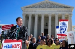 Former California Gov. Arnold Schwarzenegger speaks at a rally outside the U.S. Supreme Court in Washington, Oct. 3, 2017. The Supreme Court heard arguments in a case about political maps in Wisconsin that could affect elections across the country.