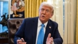 US President Donald Trump speaks to the press after signing an executive order withdrawing his country from a number of United Nations bodies in the Oval Office of the White House on February 4, 2025 in Washington, DC.