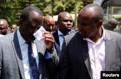 Opposition leader Raila Odinga of the National Super Alliance (NASA) coalition reacts at the Chiromo mortuary, in Nairobi, Kenya, Jan. 16, 2019.