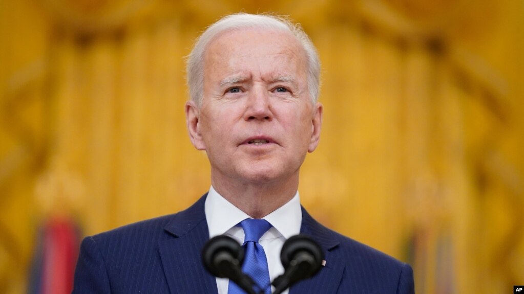 President Joe Biden speaks during an event to mark International Women's Day, Monday, March 8, 2021, in the East Room of the White House in Washington. (AP Photo/Patrick Semansky)
