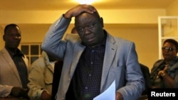 Zimbabwe's Prime Minister Morgan Tsvangirai gestures during a news conference, Harare, Aug. 3, 2013.
