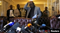 FILE: Zimbabwe's Prime Minister Morgan Tsvangirai gestures during a news conference, Harare, Aug. 3, 2013.