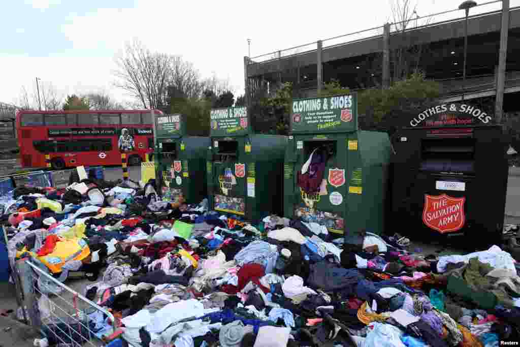 Clothing donation containers are seen as the spread of the coronavirus disease (COVID-19) continues, London.