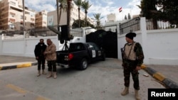 A general view of security in front of the Egyptian embassy in Tripoli, Jan. 25, 2014.