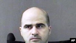 U.S. Major Nidal Hasan at the San Antonio to Bell County Jail in Belton, Texas, (File)