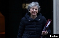 Britain's Prime Minister Theresa May leaves 10 Downing Street in London, Jan. 18, 2017.