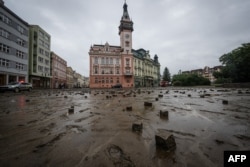 This photo taken on Sept. 16, 2024 in Krnov, Czech Republic, shows the city's main square covered in mud after it was flooded by the Opava river.