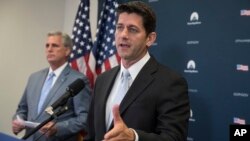 House Speaker Paul Ryan of Wisconsin, joined by House Majority Leader Kevin McCarthy of California, meets with reporters during a news conference on Capitol Hill in Washington, July 12, 2017.