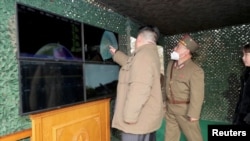 FILE - North Korean leader Kim Jong Un supervises a test launch of an intercontinental ballistic missile at an undisclosed location in this still image of a photo used in a video released by North Korea's Korean Central News Agency, April 14, 2023. KCNA via REUTERS TV/via REUTERS