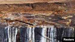 FILE: Uranium ore is heap leached with sulfuric acid at Areva's Somair mine in Arlit, Niger. Taken Sept. 25, 2013. 