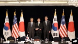 South Korea's Special Representative for Korean Peninsula Peace and Security Affairs Hwang Joon-kook, center, U.S. State Department’s Special Representative for North Korea Policy Sung Kim, right, and Japanese Foreign Ministry’s Director-General for Asian