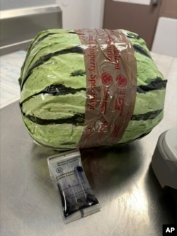 A fake watermelon used to disguised a shipment of methamphetamines is shown after a bust by US Customs and Border Protection, Aug. 16, 2024, in Otay Mesa, Calif.