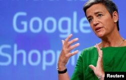 FILE - European Competition Commissioner Margrethe Vestager holds a news conference at the EU Commission's headquarters in Brussels, Belgium, June 27, 2017.