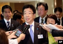 Katsunobu Kato, Japanese Minister in charge of the abduction issue, responds to questions, May 3, 2018, at the United Nations headquarters.