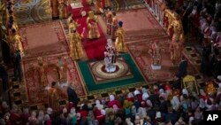 Russian Orthodox Patriarch Kirill, center, conducts the Easter service in Christ the Savior Cathedral in Moscow, Russia, April 12, 2015.