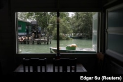 A view from the living room of a wooden stilt house on Singapore’s Pulau Ubin island, November 1, 2024. (REUTERS/Edgar Su