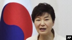 South Korean President Park Geun-hye speaks during a luncheon meeting with members of charity groups at presidential house in Seoul, South Korea, Thursday, Aug. 20, 2015.