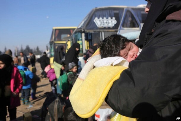 Syrians evacuated from the embattled Syrian city of Aleppo during the ceasefire arrive at a refugee camp in Rashidin, near Idlib, Syria, Dec. 20, 2016.