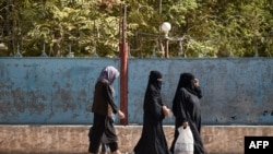 The U.N. says that the Taliban imposed more than 100 decrees denying women and girls their rights and freedom. (AFP Photo by Atif Aryan, File)