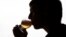 Arnaud Laloy, member of the Belgian Homebrewers association, tastes his own beer as he starts brewing in the garage of his house in Neufchateau, Belgium, Aug. 11, 2016.