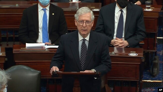 Mitch McConnell of Ky., speaks as the Senate reconvenes after protesters stormed into the U.S. Capitol on Wednesday, Jan. 6, 2021.