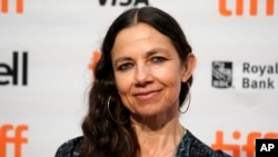 Justine Bateman, writer/director of "Violet," poses before a screening of the film at the 2021 Toronto International Film Festival, Thursday, Sept. 9, 2021, in Toronto. (AP Photo/Chris Pizzello)