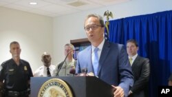 FILE - U.S. Attorney William Hochul speaks about the arrest of Arafat Nagi during a news conference in Buffalo, N.Y., July 29, 2015. Nagi has pleaded guilty of trying to help Islamic State.