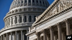 FILE - The Senate (R) and the Capitol Dome are seen in Washington.