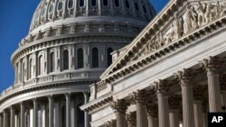 FILE - The Senate (R) and the Capitol Dome are seen in Washington.