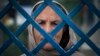 زنان زندانی به کرزی: 'ما را مانند زندانیان بگرام ببخش'