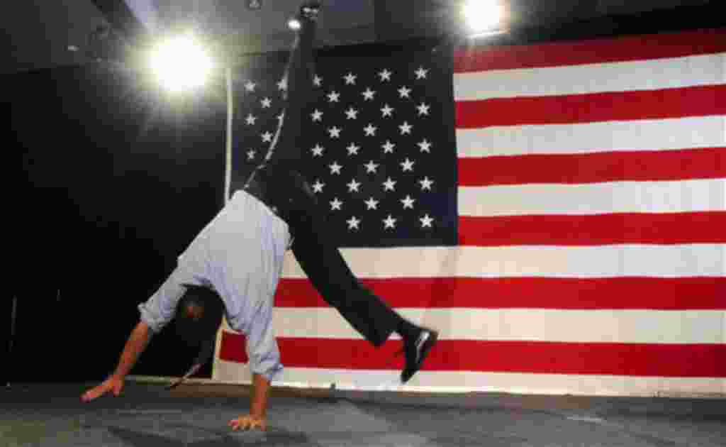 Rep. Ed Perlmutter, D-Colo., does a cartwheel at a post-election party in Denver on Tuesday, Nov. 2, 2010 after he was re-elected to his 7th district seat. (AP Photo/Chris Schneider)