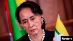 FILE - Myanmar's Aung San Suu Kyi attends a joint news conference of the Japan-Mekong Summit Meeting at the Akasaka Palace State Guest House in Tokyo, Japan October 9, 2018. (Franck Robichon/Pool via Reuters)