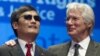 Chinese activist lawyer Chen Guangcheng (L) stands alongside actor Richard Gere (R) after being presented Tom Lantos Human Rights Prize Jan 29, 2013