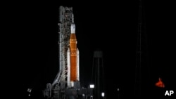 NASA's new moon rocket sits on Kennedy Space Center's Launch Pad 39-B Tuesday, Nov. 15, 2022, hours before a planned liftoff in Cape Canaveral, Fla. 