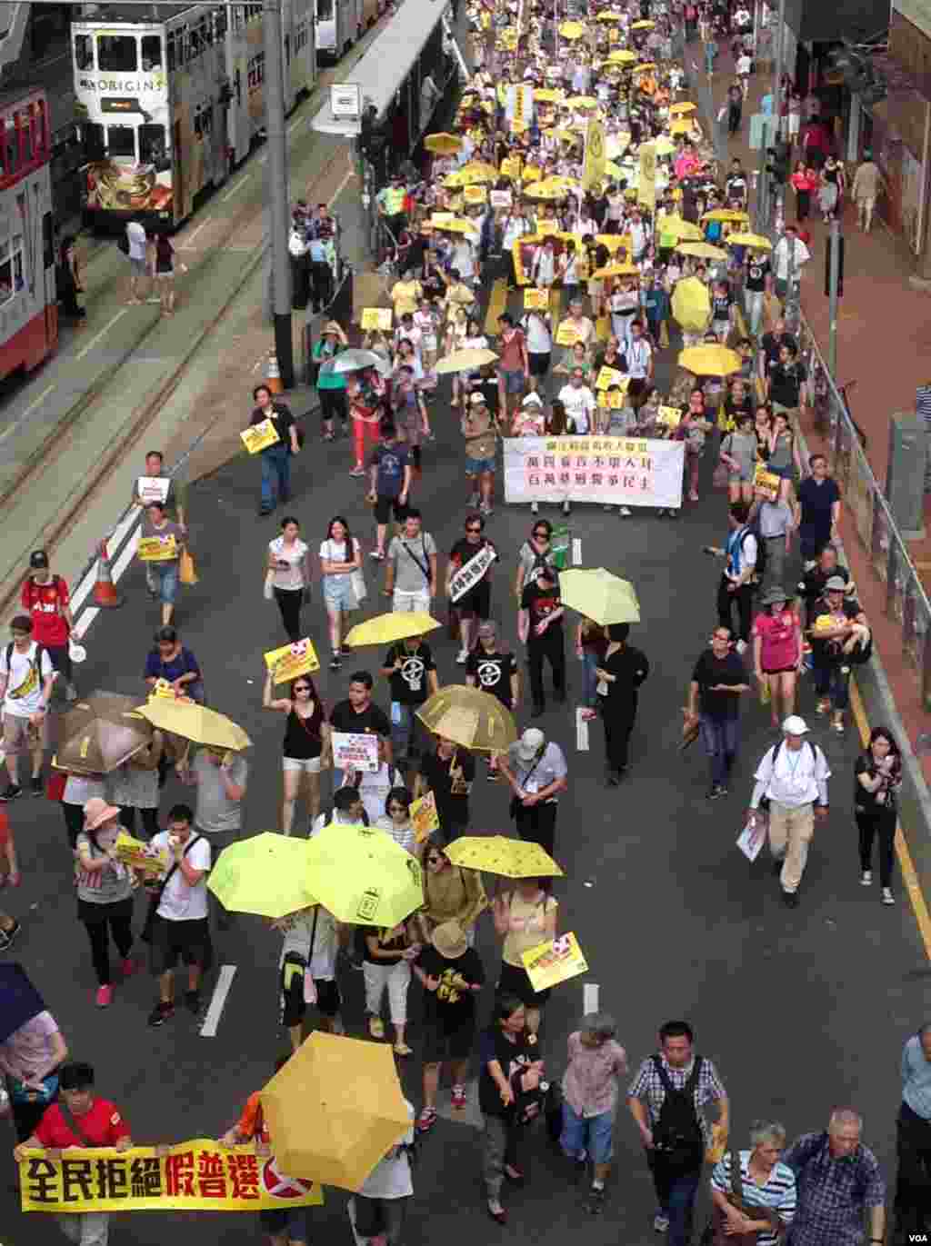 “全民拒绝假普选”滚动式游行集会6月14日在香港开启。（美国之音海彦拍摄）