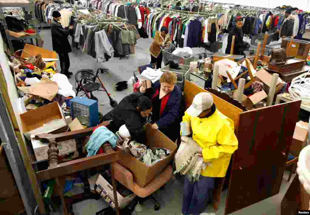 People look for clothes at the Capuchin Soup Kitchen service center in Detroit, where hundreds of people receive food and supplies every day.