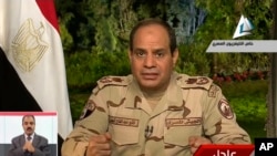 Tướng Abdel Fattah el-Sissi trong video loan báo quyết định tranh cử tổng thống ,được phát trên Đài truyền hình nhà nước Ai Cập, 26/3/2014.