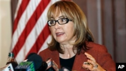 FILE - Former U.S. Rep. Gabrielle Giffords of Arizona, who co-founded the gun control group Americans for Responsible Solutions with her husband, delivers a speech in Trenton, N.J., March 18, 2015.