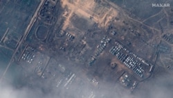 This satellite image released by Maxar Technologies on Dec. 23, 2021, reportedly shows Russian ground forces deployed at the Opuk training area on Dec. 22, 2021. (Photo by Handout/Satellite image ©2021 Maxar Technologies / AFP)