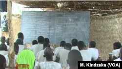 FILE - Schoolchildren are taught in makeshift classroom in Maroua, Cameroon, April 15, 2019.