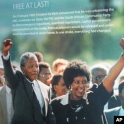 At exhibit at the Apartheid Museum in Johannesburg illustrating a photograph of Nelson Mandela's walk from prison with his then spouse, Winnie Mandela