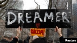 FILE - Activists and DACA recipients march up Broadway during the start of their 'Walk to Stay Home,' a five-day 250-mile walk from New York to Washington D.C., to demand that Congress pass a Clean Dream Act, in Manhattan, New York, U.S., Feb. 15, 2018. 