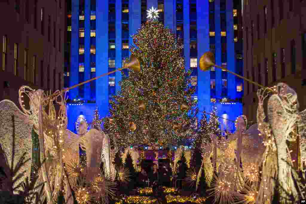 The Rockefeller Center Christmas tree stands lit during the 85th annual Rockefeller Center Christmas tree lighting ceremony in New York, Nov. 29, 2017.
