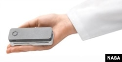 The MinION (aka Biomolecule Sequencer), a miniaturized DNA sequencer, by Oxford Nanopore Technologies.